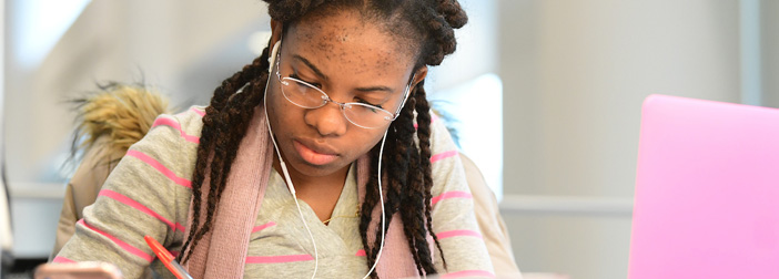 female student with earphones