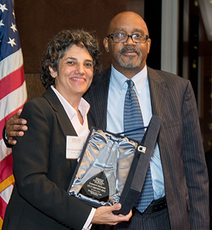 Professor Elizabeth Cooper presented the Life of Commitment Award to Leonard Noisette. 
