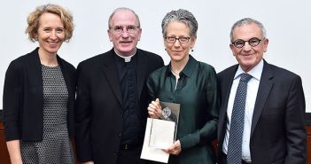 Fordham Law Associate Dean for Research Clare Hunington; Joseph M. McShane, S.J., president of Fordham; Professor of Law Jennifer Gordon; and Fordham University Provost Stephen Freedman. Photo by Chris Taggart.