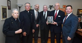 (L-R) Daniel Sullivan, S.J. professor of biology; Alumni Chaplain Daniel J. Gatti, S.J.; PCS student Kevin Knightes, president of Fordham Veterans Association; (Retired) Col. Edward Winkler, FCRH '67, LAW '72, Hall of Fame Inductee Thomas W. Hyland, FCRH '65, LAW '71; and (Retired) Master Sergeant Matthew Butler, PCS '16, director of Military and Veterans' Services at Fordham.