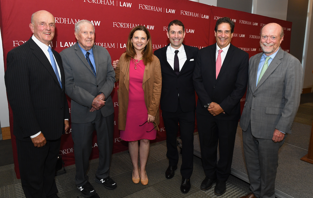 Dean Landau, center, flanked by his predecessors Deans Matthew Diller and William Treanor (right), Deans Michael Martin and John Feerick ’61 (left), and Fordham University President Tania Tetlow.